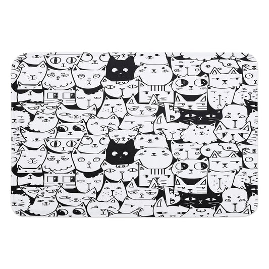 Black and White Animated Cats with Differing Expressions Kitchen Mat